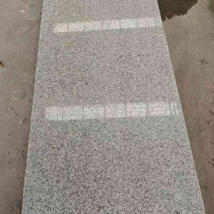 安阳芝麻白光面毛板