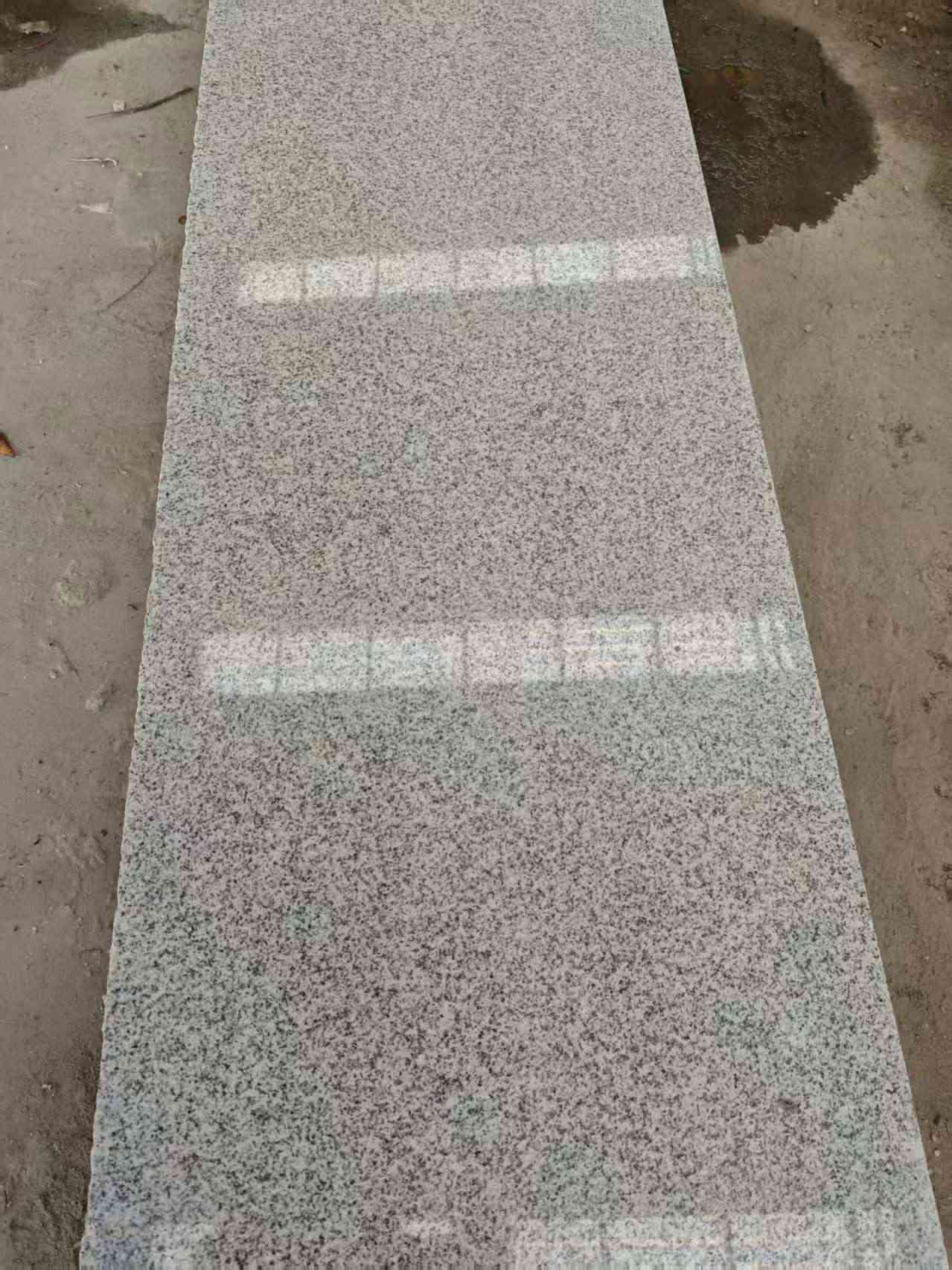 安阳芝麻白光面毛板